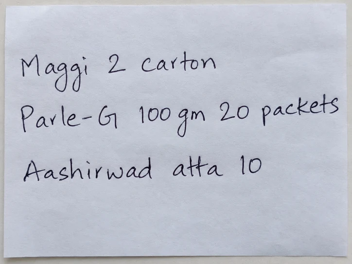 Handwritten list: Maggi 2 carton, Parle-G 100 gm 20 packets, Aashirwad atta 10